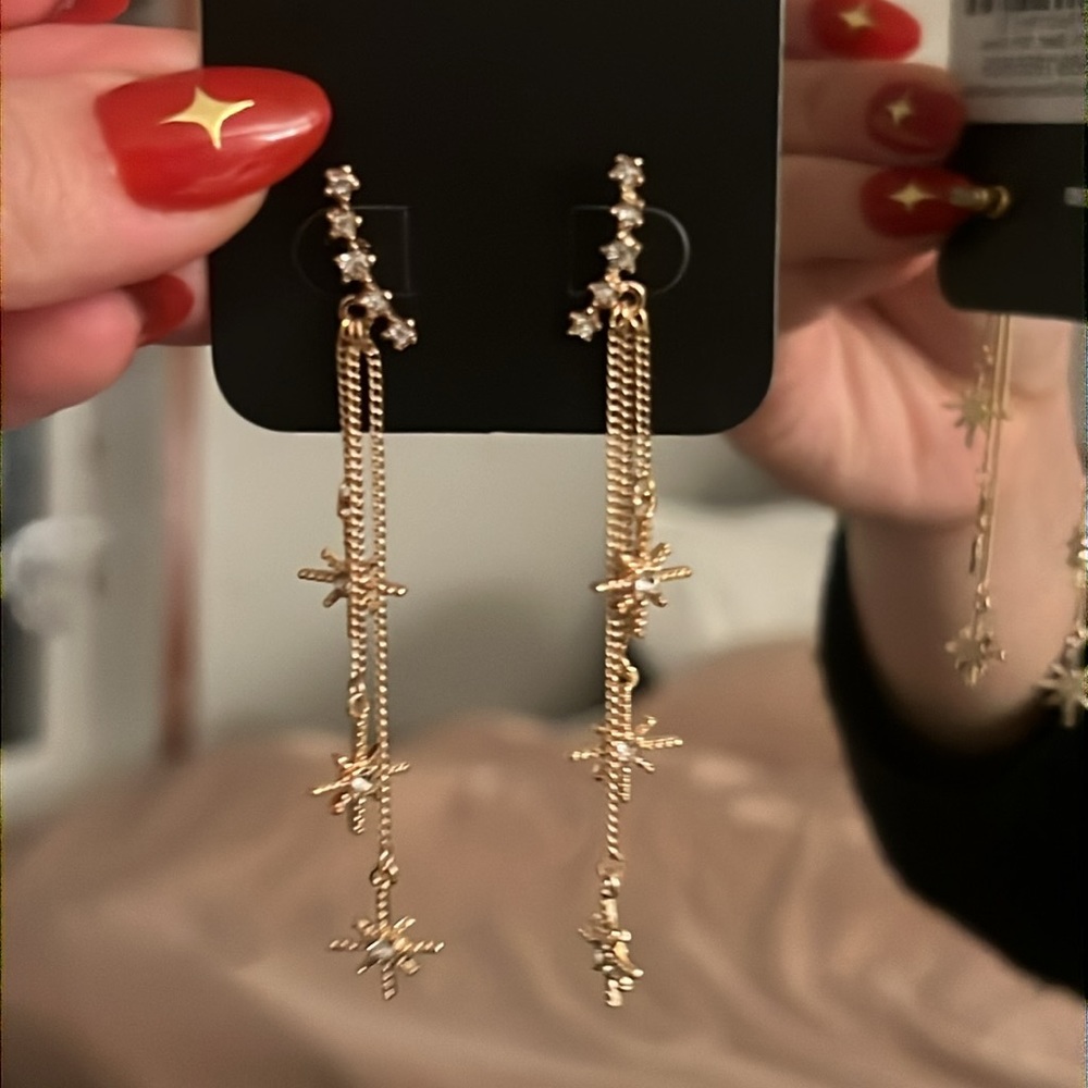 Pretty little thing celestial gold star earrings